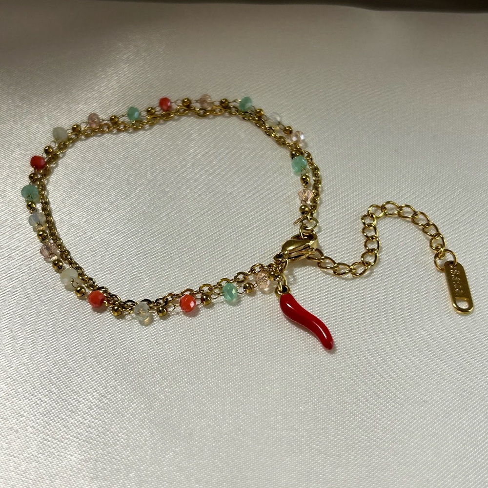 Elegant Gold Beaded Bracelet with Red Charm